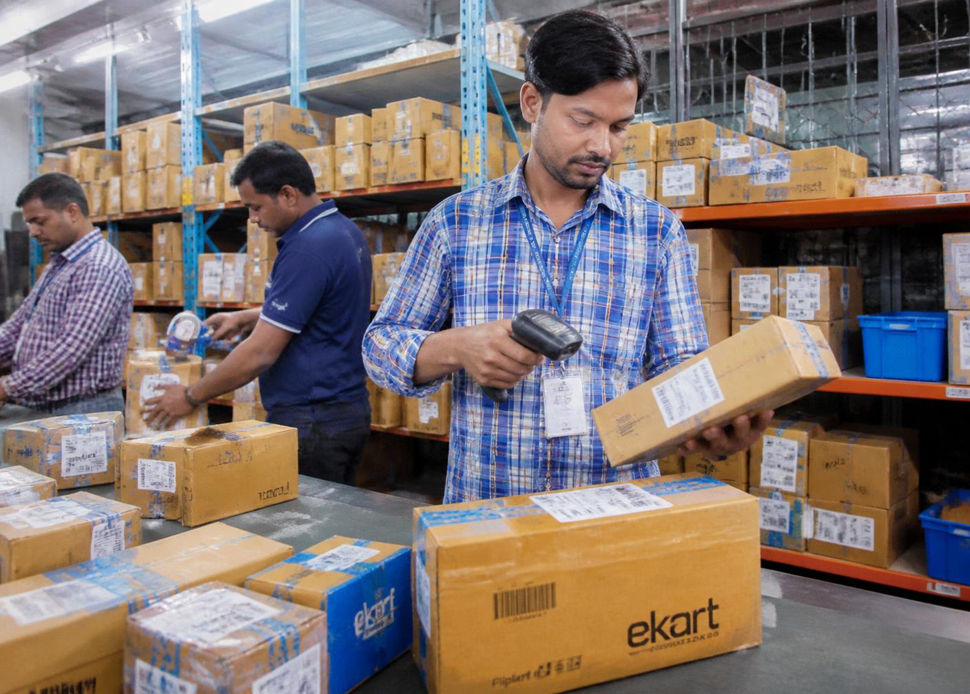 Warehouse team picking, packing and labelling marketplace orders for dispatch